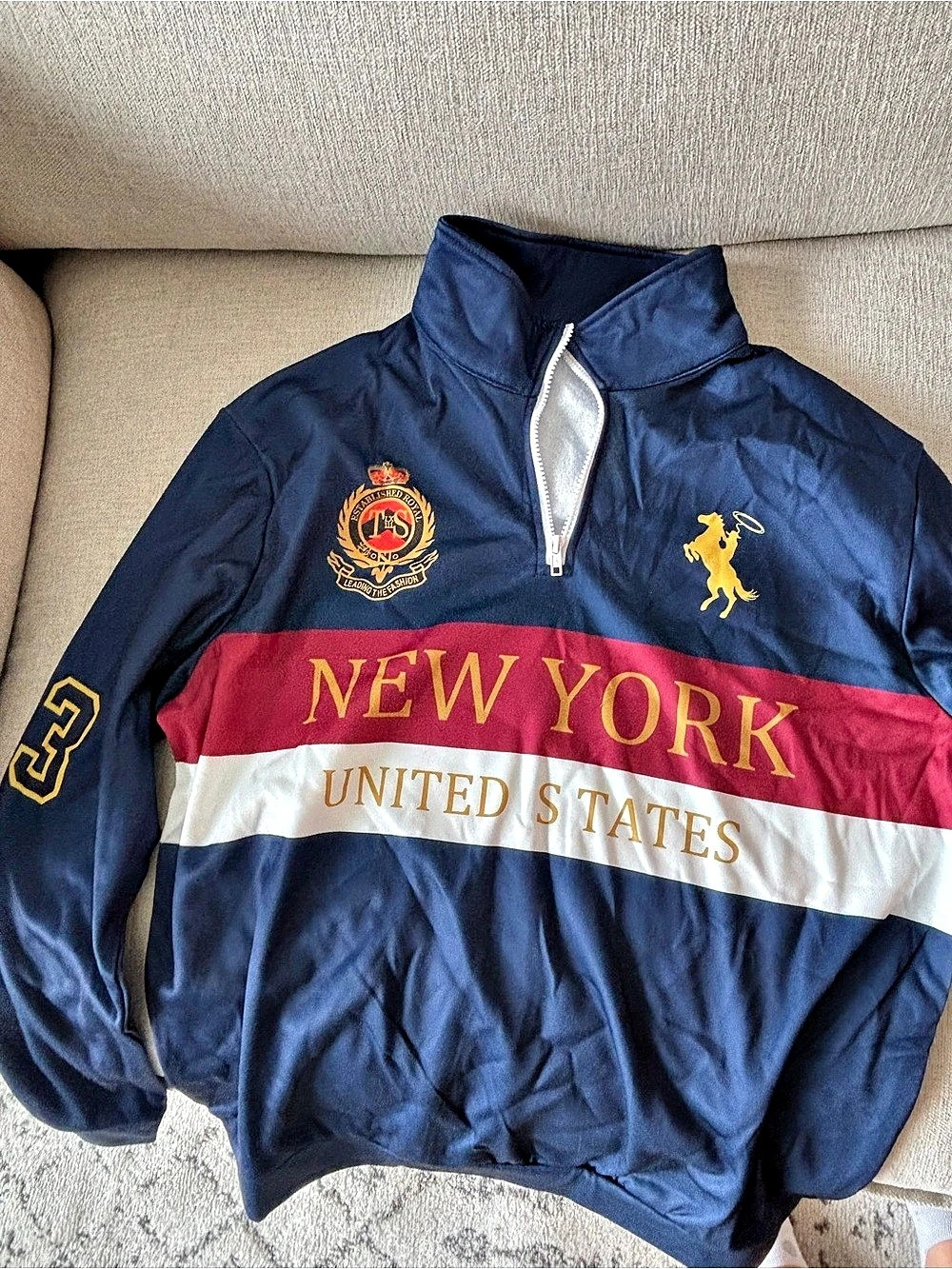 Sporty & Rich NY Crest Embroidered Quarter Zip Color Block Jacket in Blue & Red
